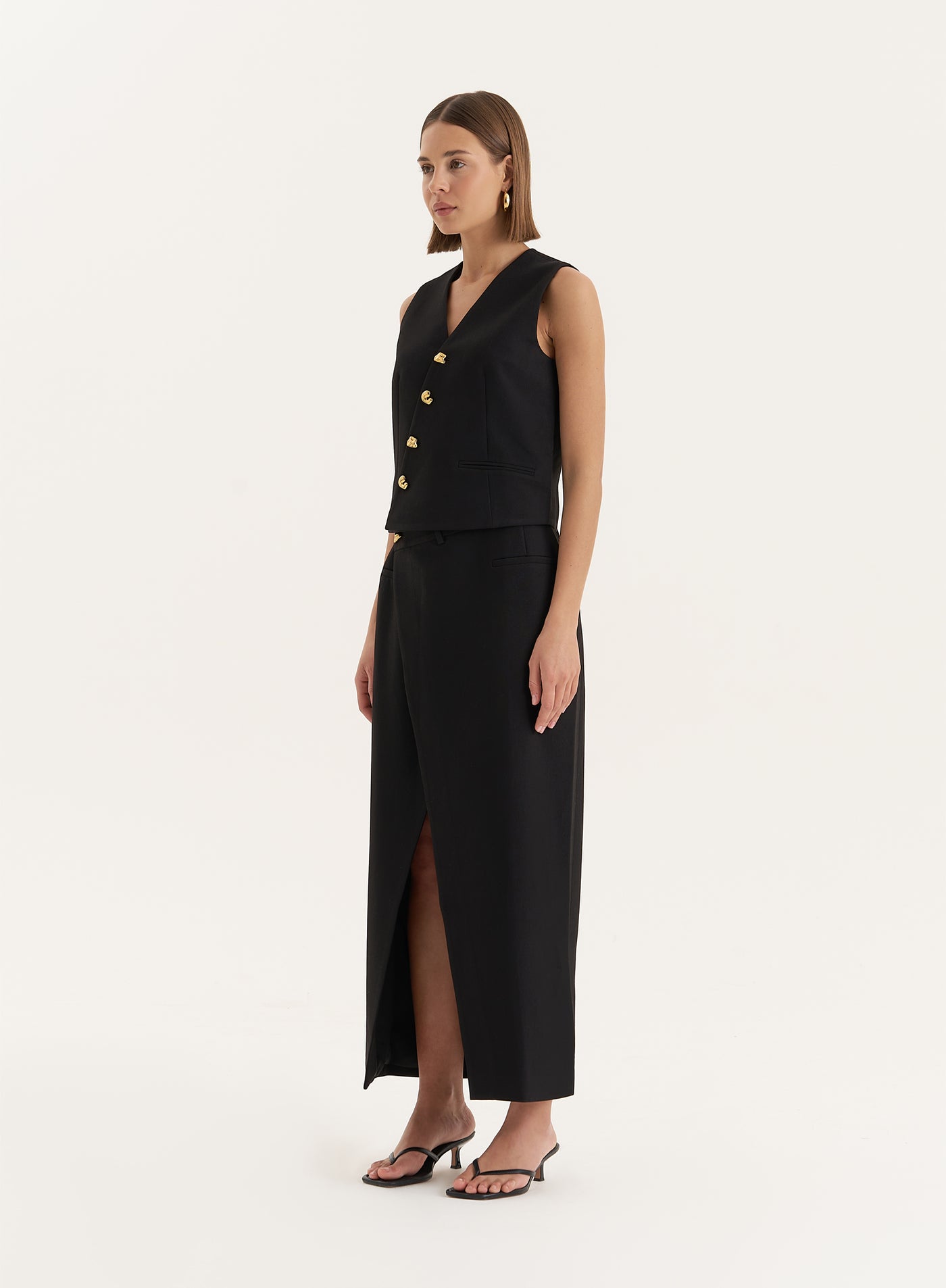 アウターその他 GOLDEN  Woman Waistcoat Black GWP01922P00169190100 Women's Black Asymmetric Gold Button Front Waistcoat | Brie