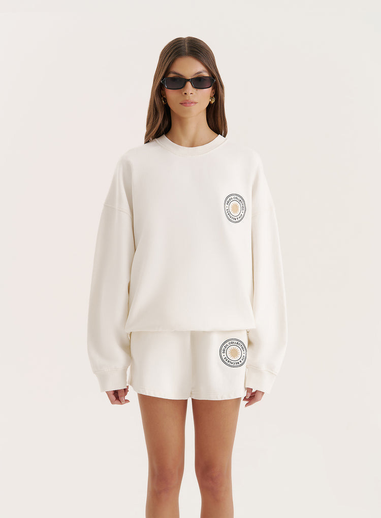 Off White Embroidered Emblem Sweatshirt- Nina